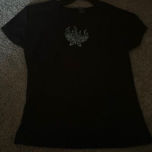 women’s black shirt with blue butterfly